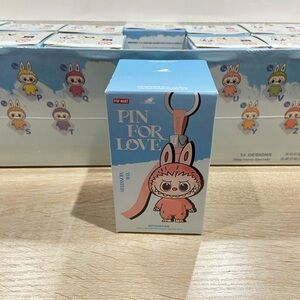 The Monsters Pop Mart Labubu “Pin for Love” vinyl keychain letters S V Y X